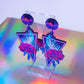 Large purple tropical flower dangles